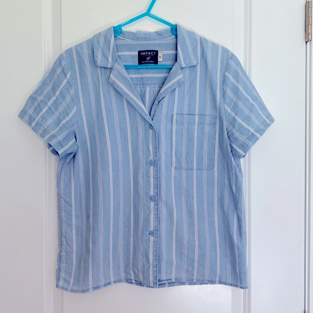 Blue button down shot sleeve united by blue shirt